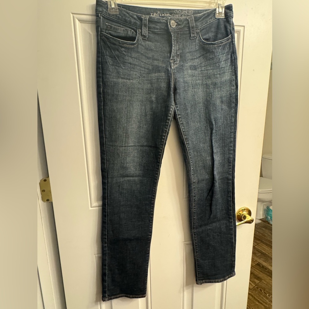 Low-rise straight-leg medium-wash jeans
